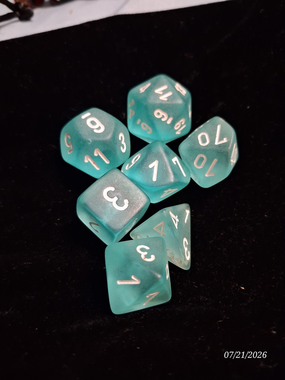 Source Unknown Teal Seven-Piece RPG Dice Set with White Numbers